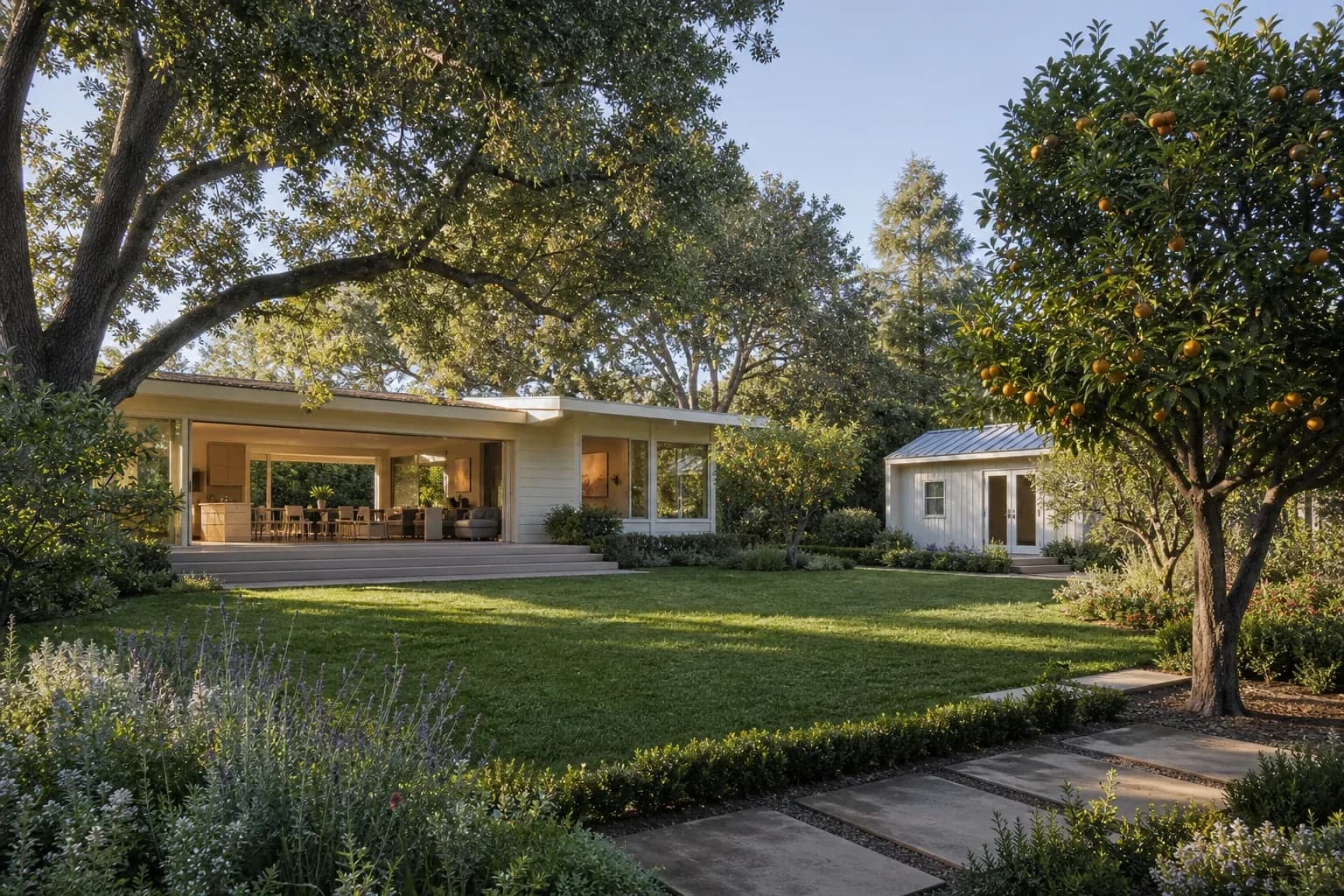 Mid-century Los Altos home opening to an orchard-inspired garden.