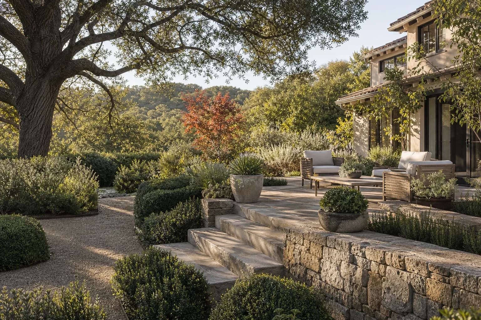 Stone terrace and landscaped garden beside a Peninsula residence.